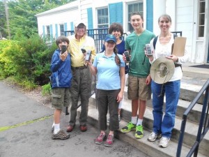 Lucas James, Ed Johnston, Linda Roy, Cary Chadwick, Nick Nieves and Amy Farmer enjoy a day of geocaching at the UConn Extension Center. Photo by Merja Lehtinen. 