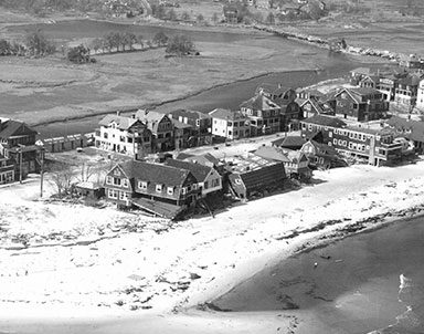 historical aerial of damaged coastline
